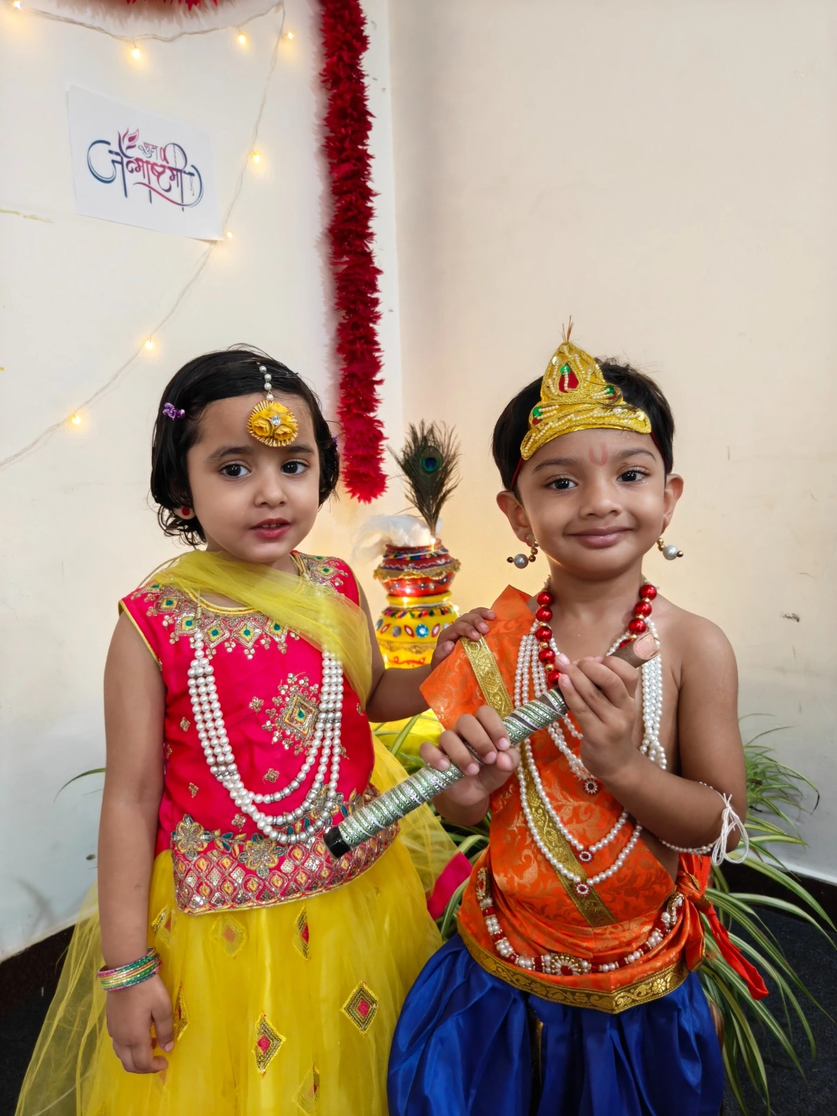 Young students dressed as Radha and Krishna