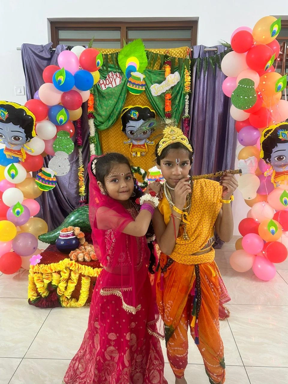 Students celebrating Janmashtami in traditional festive attire