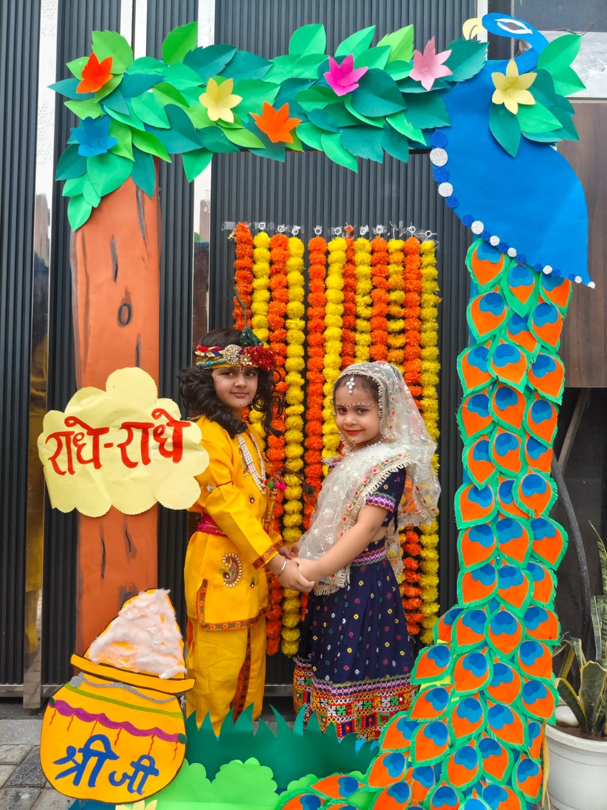 Children dressed in colourful traditional clothes for Janmashtami