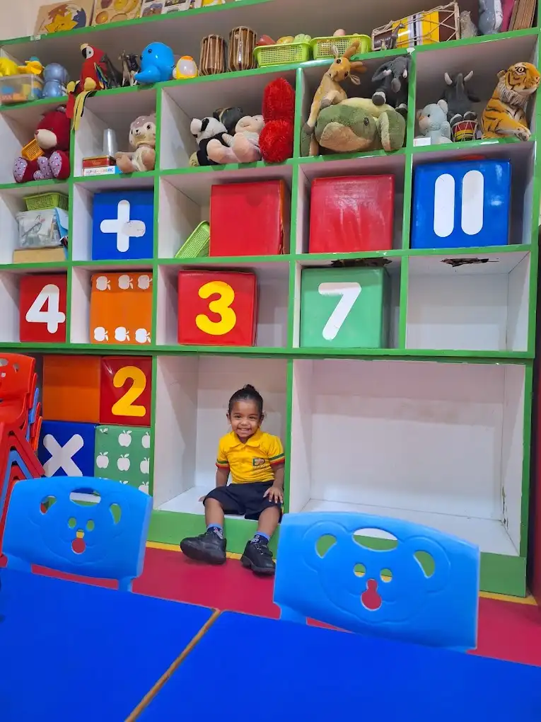 A student in a colourful play-based classroom